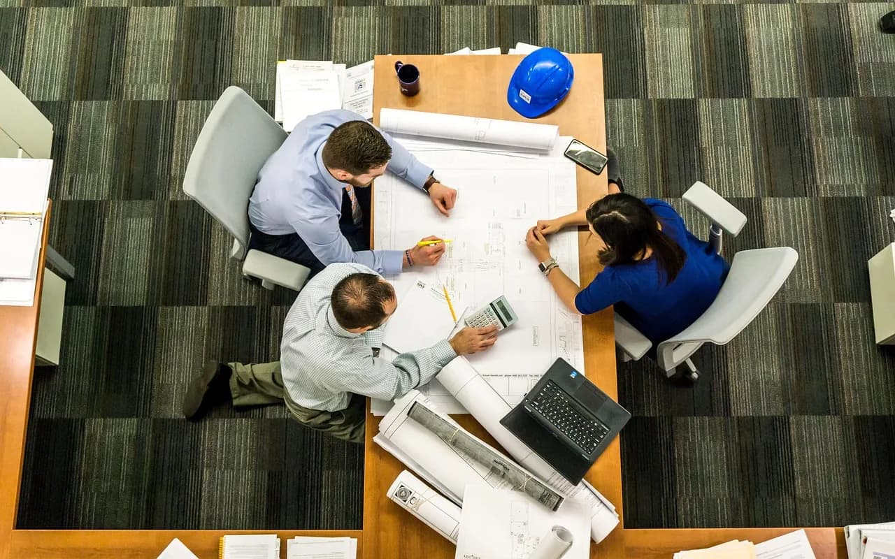 MaxLife Commercial team reviewing commercial property plans
