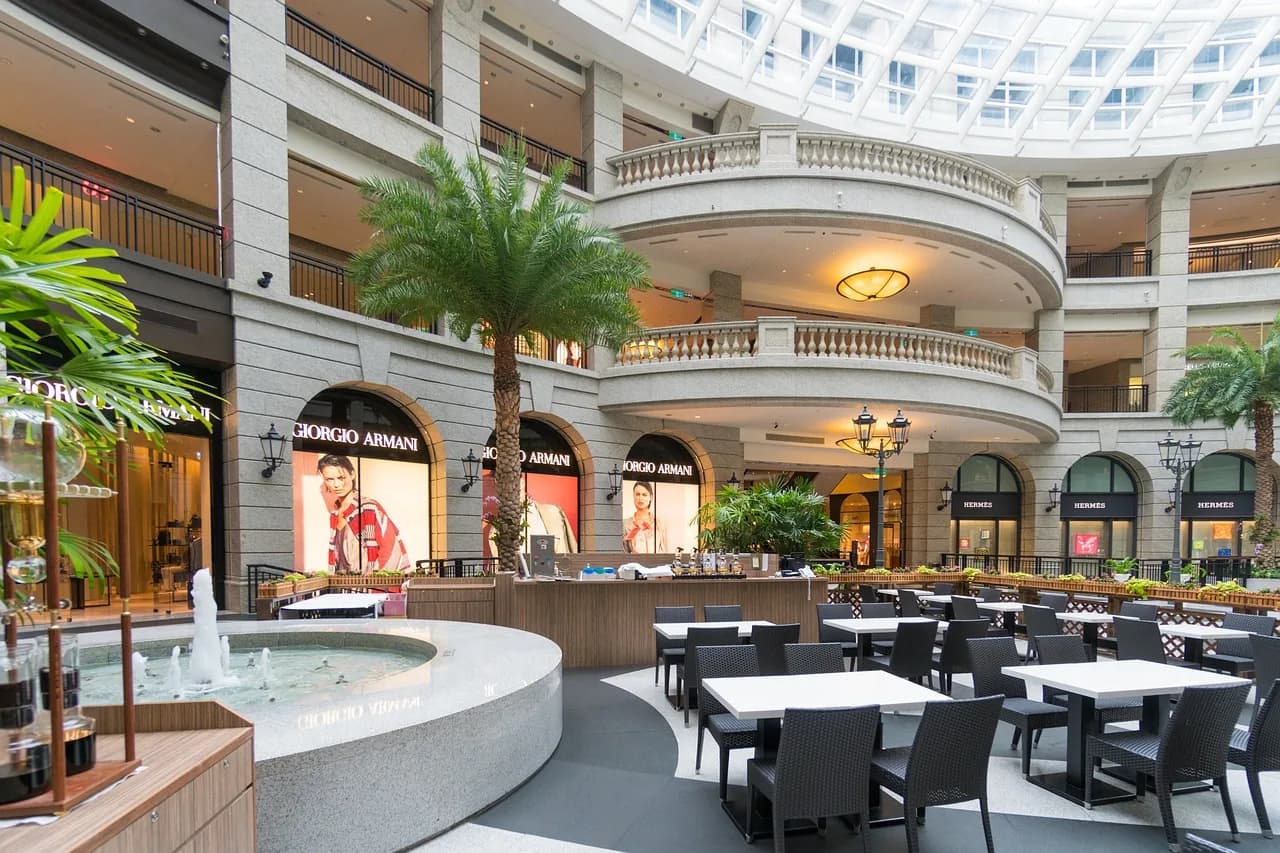 Lifestyle center atrium with dining and landscaping